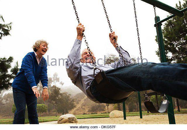 Wife swinging outdoor