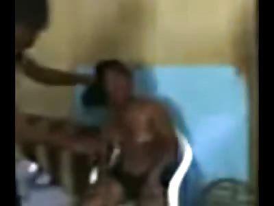 Woman stripped naked by gang video